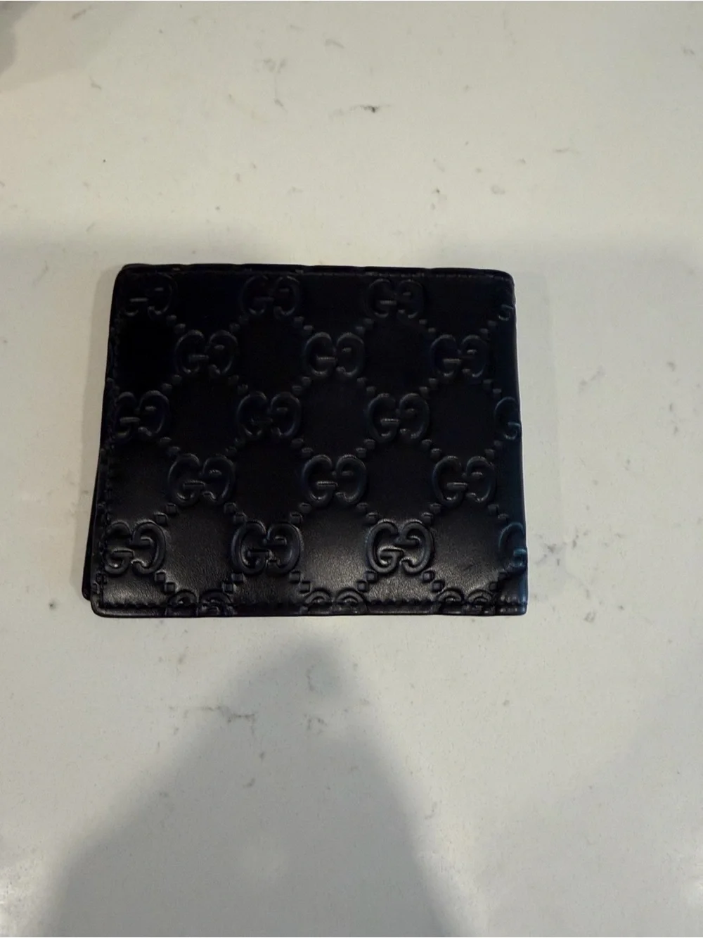 Gucci Black Embossed GG Leather Wallet with Silver-Tone Logo